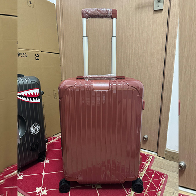 rimowa essential glossy burgundy carry-on suitcase